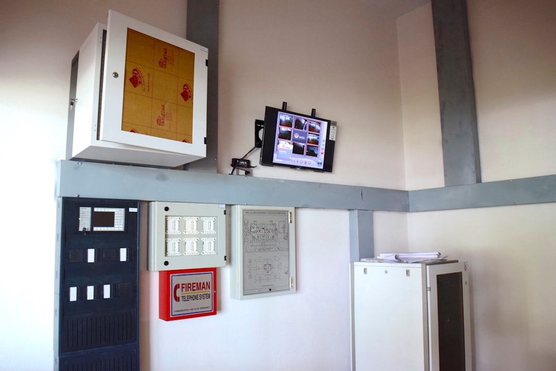 Employee badge access scanner at an office entrance